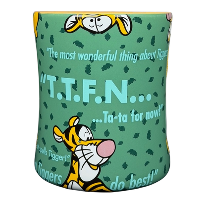 Tigger T.T.F.N. Glitter Collectible Mug Disney Parks featuring fun quotes and colorful design