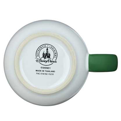 Bottom view of a Peter Pan Never Grow Up Disney mug with green handle and Disney logo