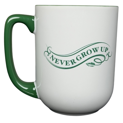 Peter Pan Never Grow Up Disney mug with a green handle and whimsical lettering