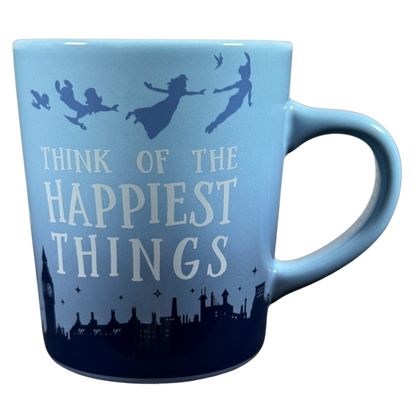 Disney Peter Pan Think of the Happiest Things mug. Light blue ceramic mug with flying silhouettes and London skyline