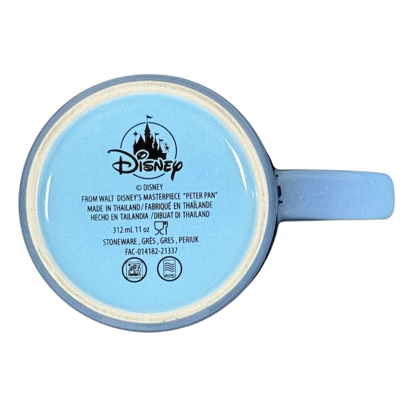Light blue stoneware mug bottom showing Disney logo and text Peter Pan Think of the Happiest Things mug
