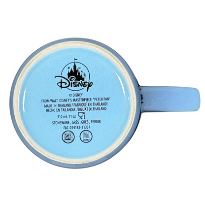 Light blue stoneware mug bottom showing Disney logo and text Peter Pan Think of the Happiest Things mug