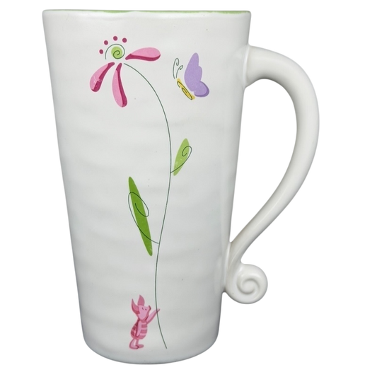 Piglet holding flower Disney mug with floral design and whimsical colors