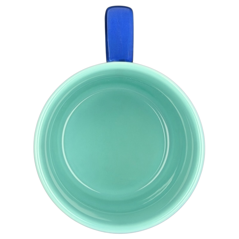 Top view of Finding Nemo Seagulls Mug Disney Pixar in turquoise with a blue handle
