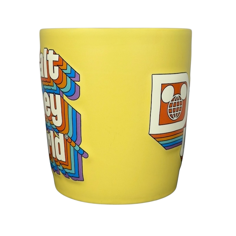 Disney retro collectible rainbow logo mug in yellow featuring iconic graphics