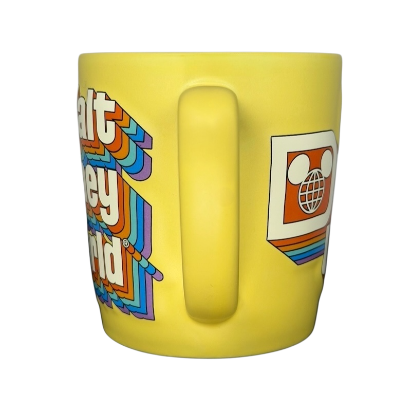 Disney retro collectible rainbow logo mug featuring vibrant colors and iconic designs