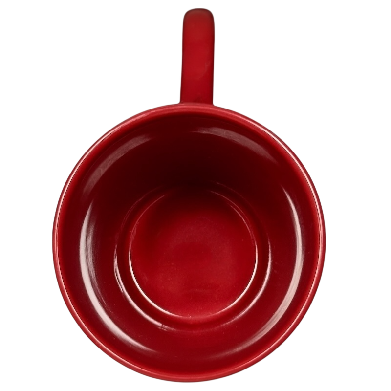 Top view of a red Snow White just one bite vintage mug by Disney with smooth interior