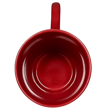 Top view of a red Snow White just one bite vintage mug by Disney with smooth interior