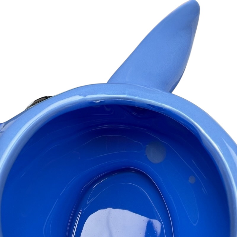 Inside view of Stitch 3D Collectible Shaped Mug Disney featuring vibrant blue color and unique design.