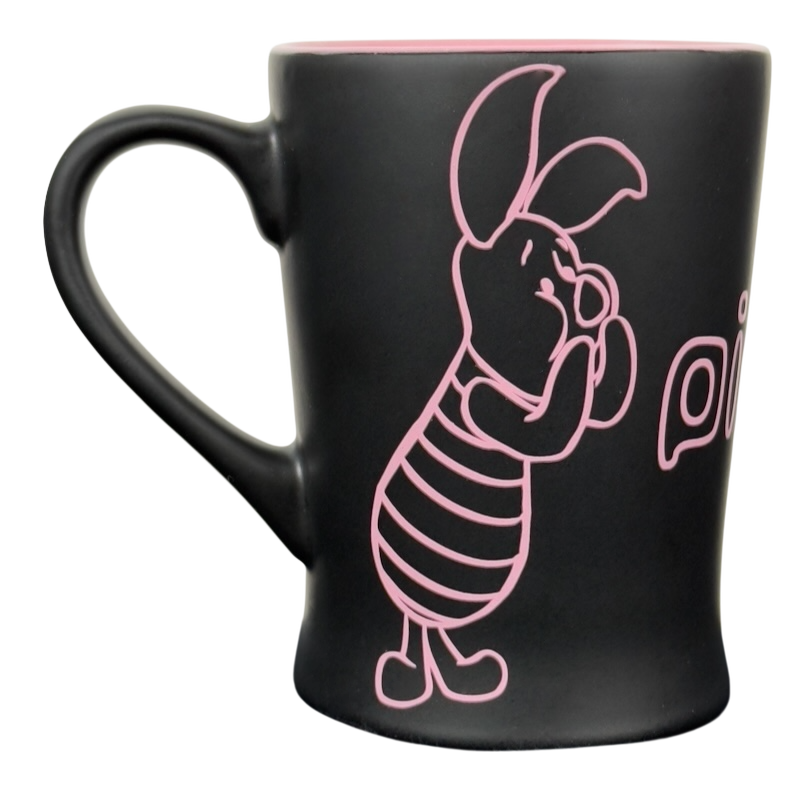 Disney collectible mug pink outline Piglet. Black matte ceramic mug with pink rim and outlined Piglet sketch