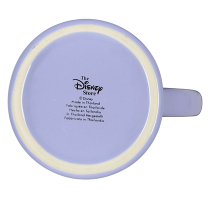 Bottom view of pale lavender Disney Tinker Bell stuck in keyhole vintage mug showing Disney Store logo and side handle