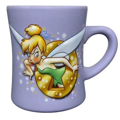 Lavender ceramic mug featuring Disney Tinker Bell stuck in keyhole vintage mug illustration and handle