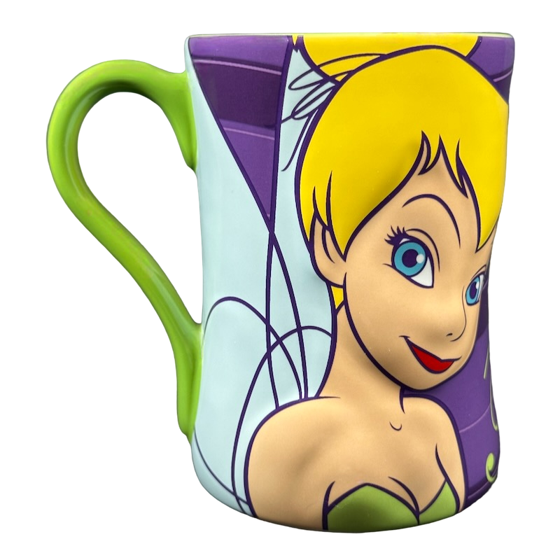 Disney Tinker Bell vintage mug showing closeup of Tinker Bell face with green handle and purple background