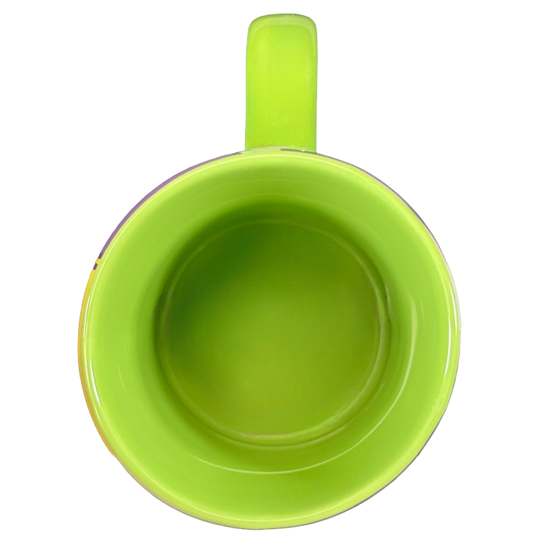 Disney Tinker Bell vintage mug top view showing lime green interior and handle on black background
