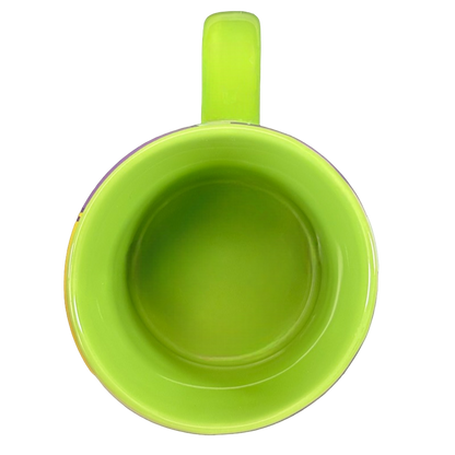 Disney Tinker Bell vintage mug top view showing lime green interior and handle on black background