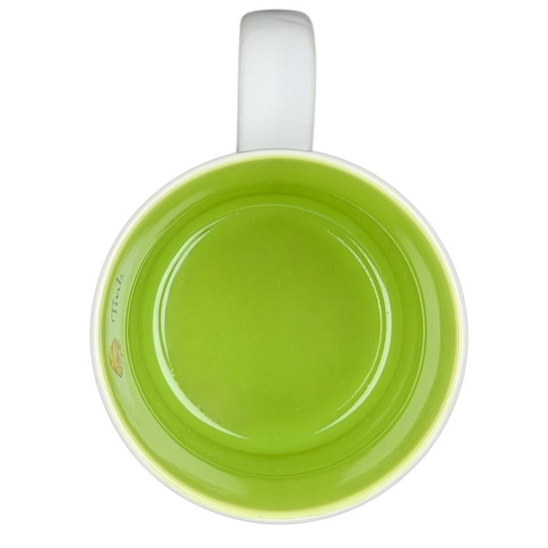 Inside view of Tinker Bell Tink Sketch Mug Disney Store with vibrant green color and smooth finish