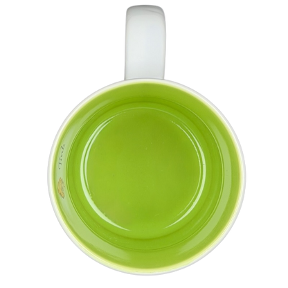 Inside view of Tinker Bell Tink Sketch Mug Disney Store with vibrant green color and smooth finish