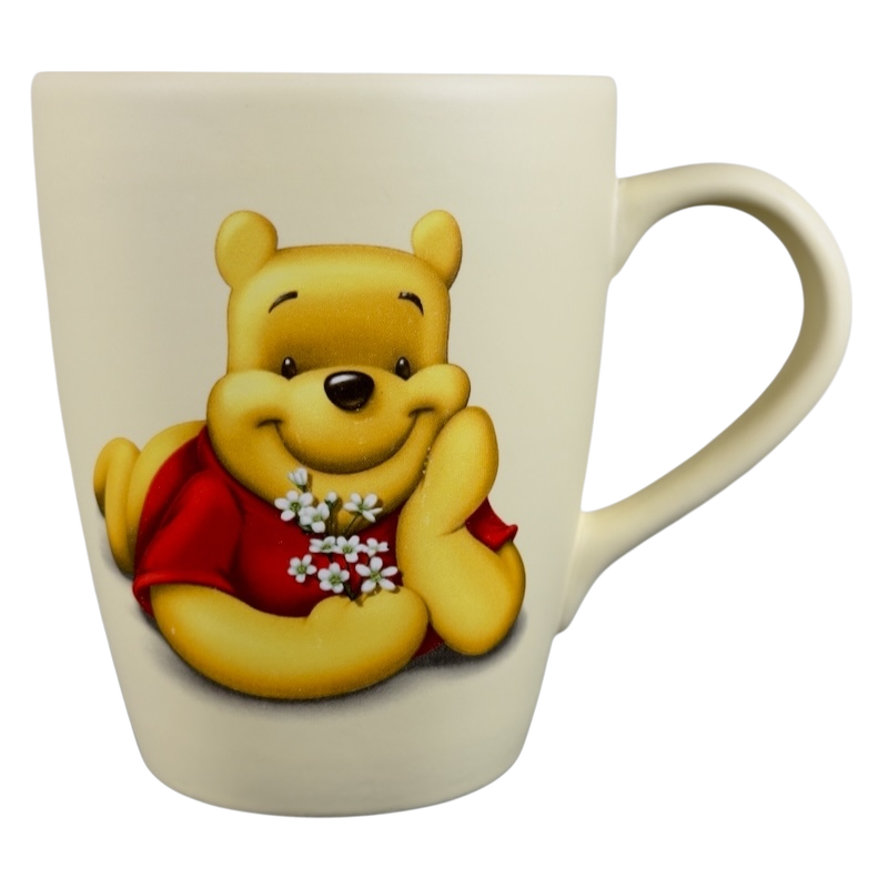Disney vintage Winnie the Pooh flowers coffee cup with Pooh holding white flowers in red shirt