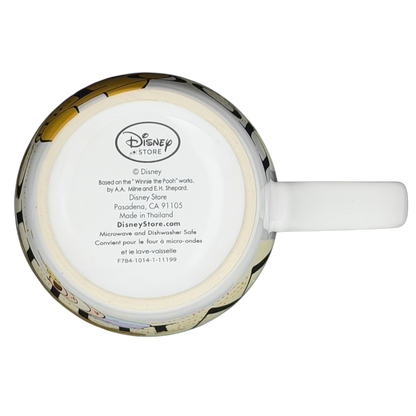 Top view of a Winnie the Pooh Storybook Mug Disney Store featuring classic illustrations and a white handle