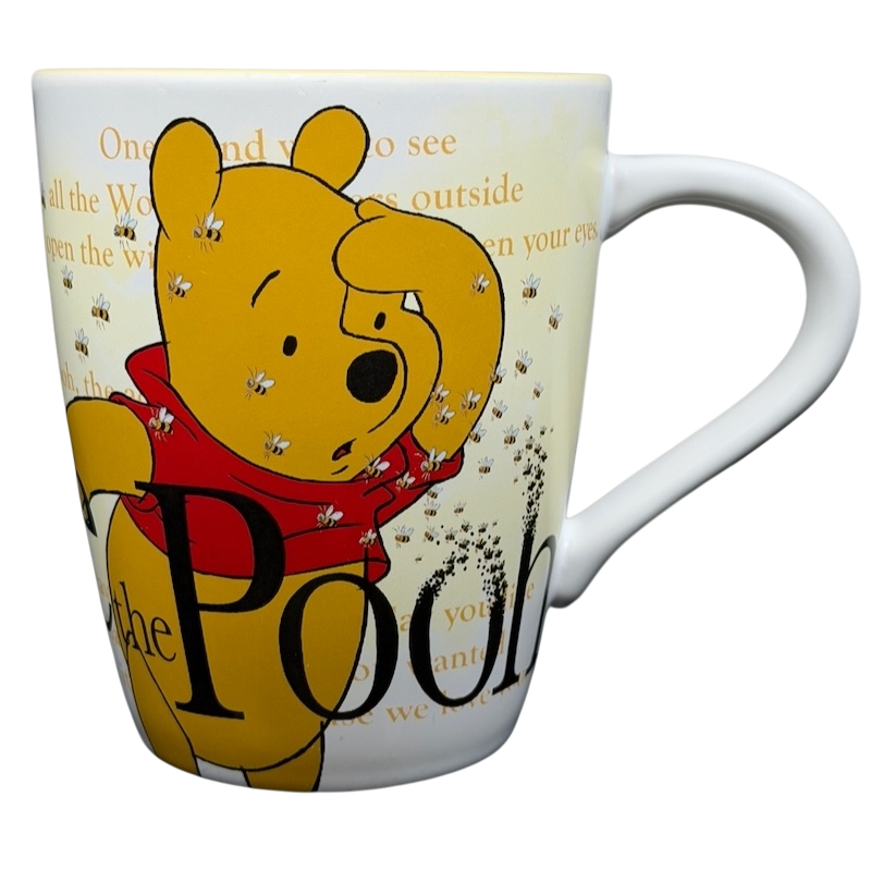 Winnie the Pooh Storybook Mug Disney Store featuring Pooh surrounded by bees in a colorful design