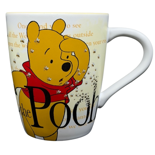 Winnie the Pooh Storybook Mug Disney Store featuring Pooh surrounded by bees in a colorful design