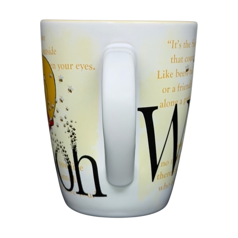 Winnie the Pooh Storybook Mug Disney Store featuring quotes and illustrations from the beloved character