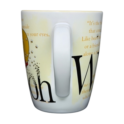 Winnie the Pooh Storybook Mug Disney Store featuring quotes and illustrations from the beloved character