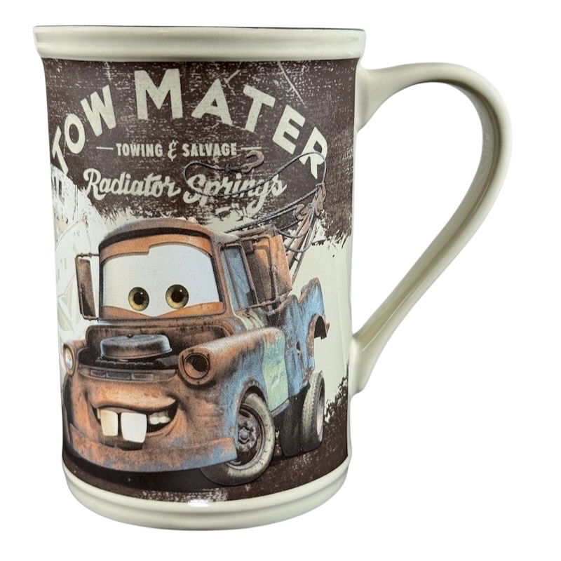 Disney Tow Mater cup vintage featuring the character Tow Mater from Radiator Springs with a rustic design