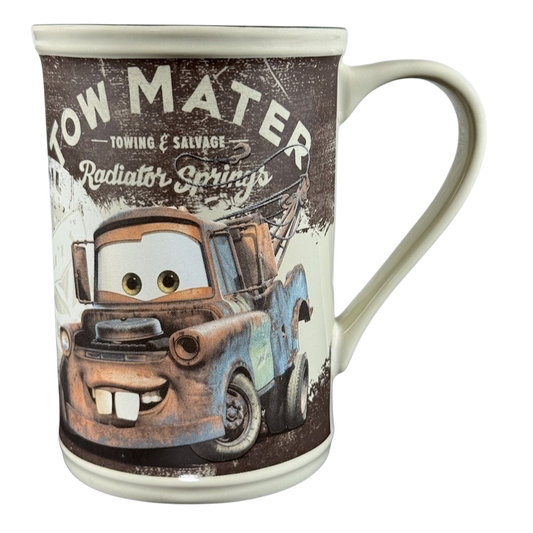 Disney Tow Mater cup vintage featuring the character Tow Mater from Radiator Springs with a rustic design