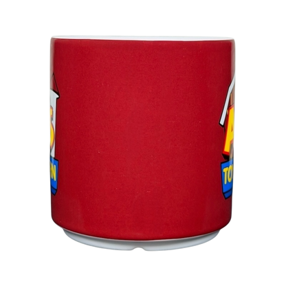 Disney Toy Story Al's Toy Barn collectible mug featuring a vibrant red design with a playful logo