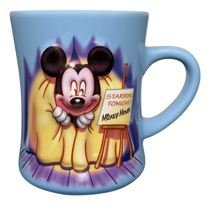 blue ceramic vintage Mickey Mouse starring tonight curtain call mug with Mickey peeking from stage curtains