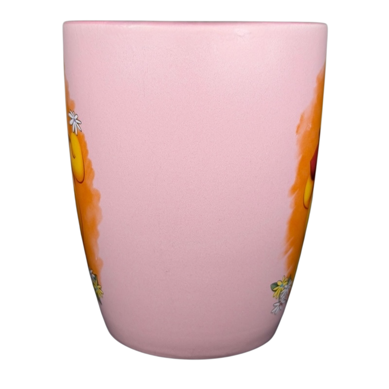 Disney Winnie the Pooh daisy pink mug featuring playful Pooh and floral designs