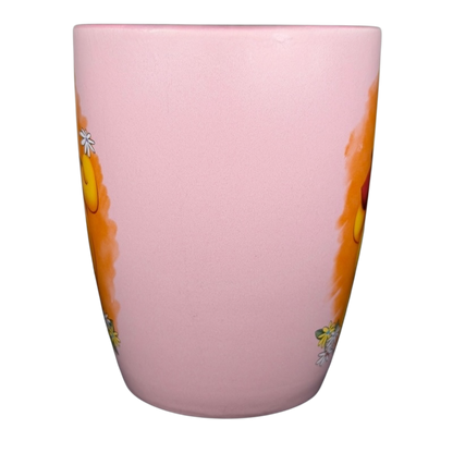 Disney Winnie the Pooh daisy pink mug featuring playful Pooh and floral designs