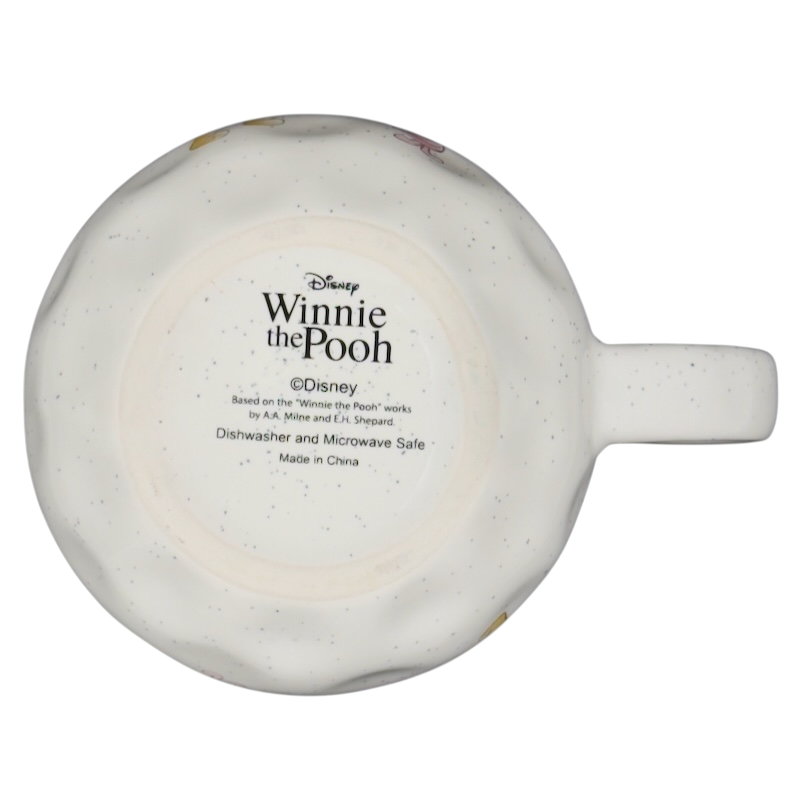 Winnie the Pooh dimpled ceramic collectible mug underside showing Disney logo dishwasher microwave safe speckled
