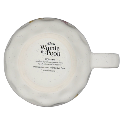 Winnie the Pooh dimpled ceramic collectible mug underside showing Disney logo dishwasher microwave safe speckled