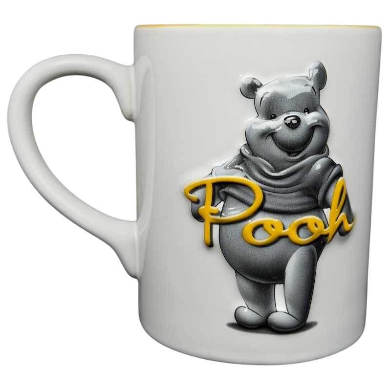 Winnie The Pooh Embossed Mug Disney featuring a 3D image of Winnie the Pooh on a white ceramic mug