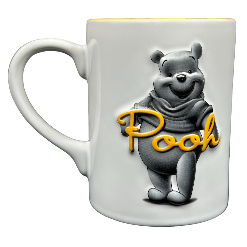 Winnie The Pooh Embossed Mug Disney featuring a 3D image of Pooh with a playful design