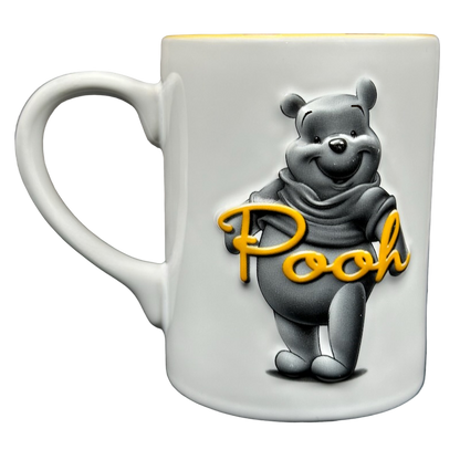 Winnie The Pooh Embossed Mug Disney featuring a 3D image of Pooh with a playful design