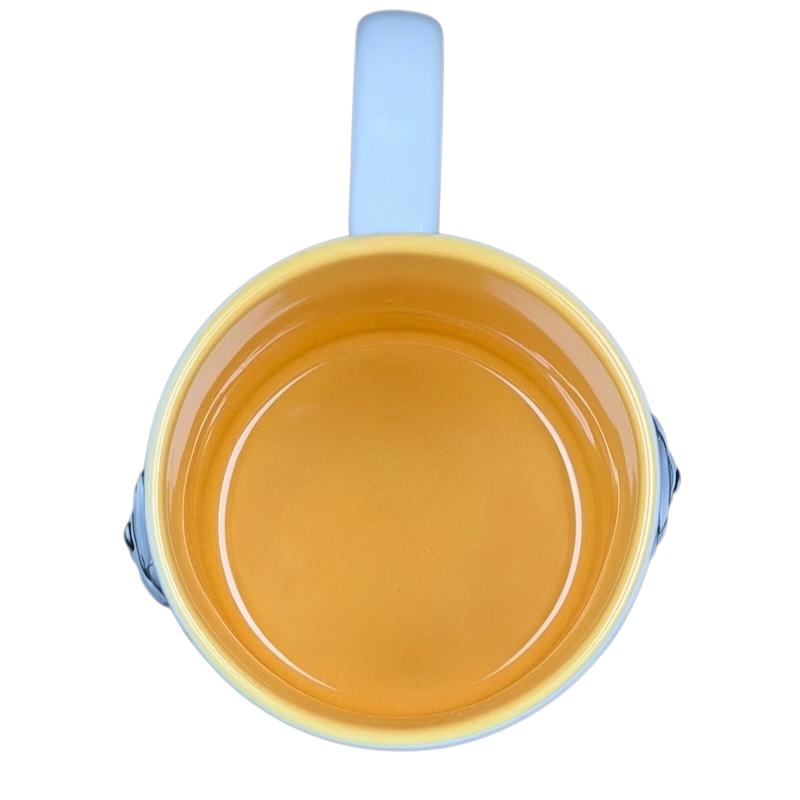 Top view of Winnie The Pooh Embossed Mug Disney showcasing vibrant colors and smooth finish