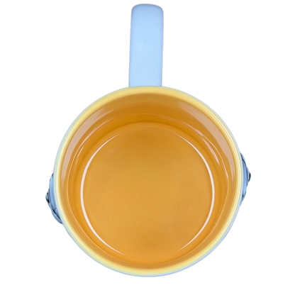 Top view of Winnie The Pooh Embossed Mug Disney showcasing vibrant colors and smooth finish