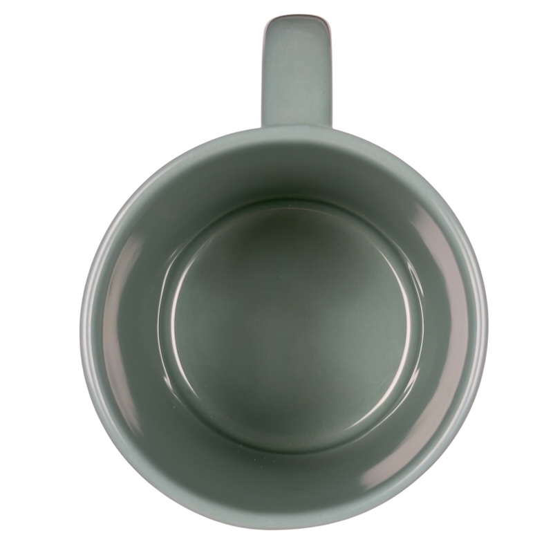 Disney Winnie the Pooh stuck in tree vintage mug top view empty green ceramic cup with handle