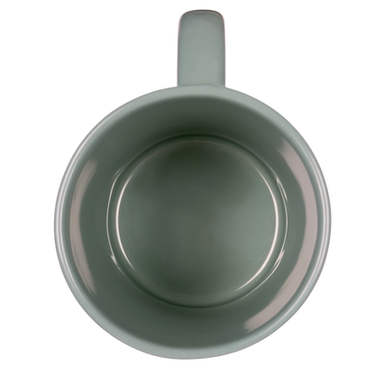 Disney Winnie the Pooh stuck in tree vintage mug top view empty green ceramic cup with handle