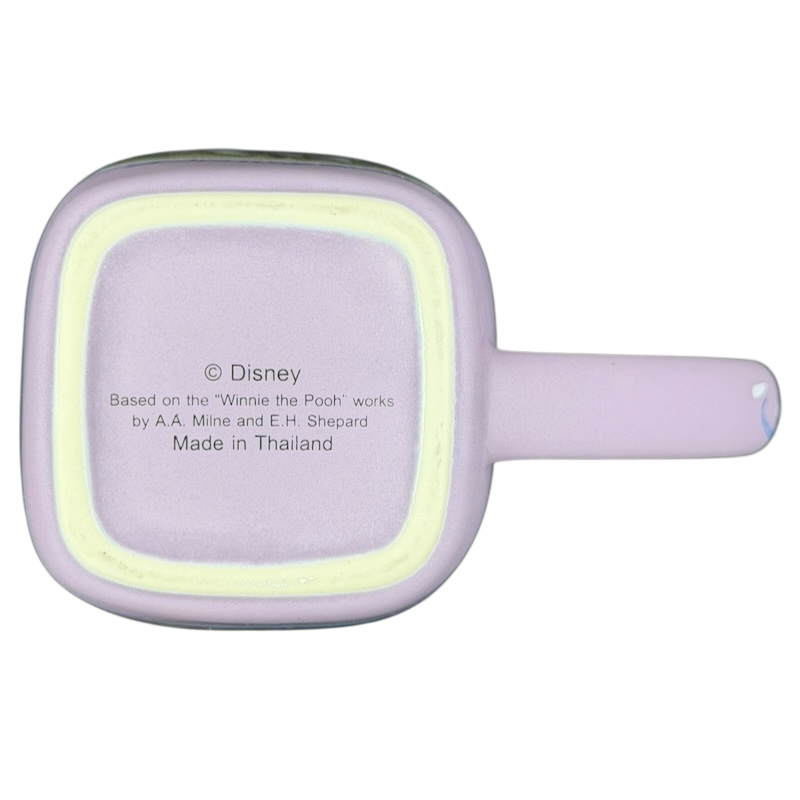 Bottom view of Disneyland Eeyore collectible mug showcasing logo and design details