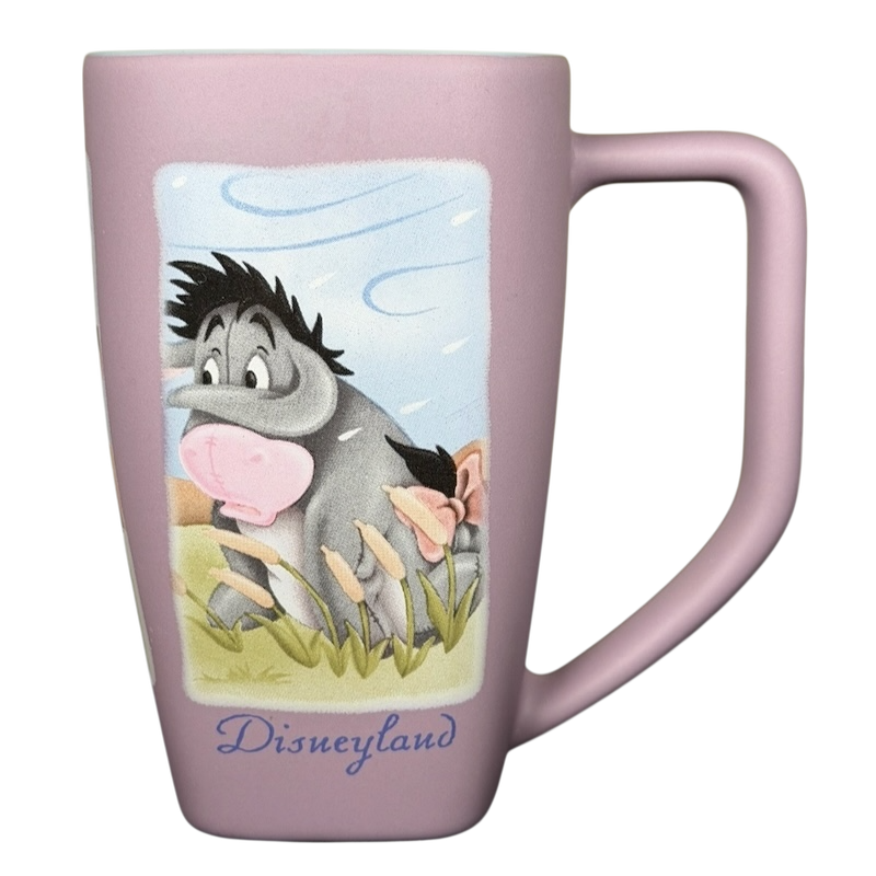 Disneyland Eeyore collectible mug featuring Eeyore with a pastel background and a comfortable handle