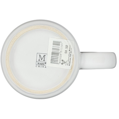 Bottom view of Disneyland Happiest Homecoming on Earth mug showing branding and price tag