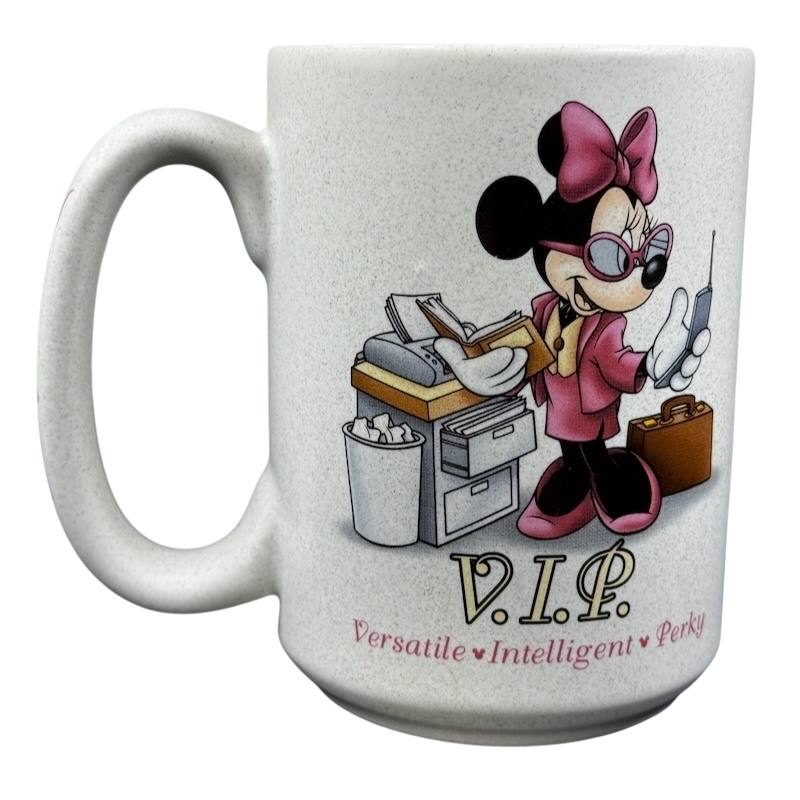Disneyland Minnie Mouse VIP vintage mug featuring a stylish Minnie with a pink outfit and accessories