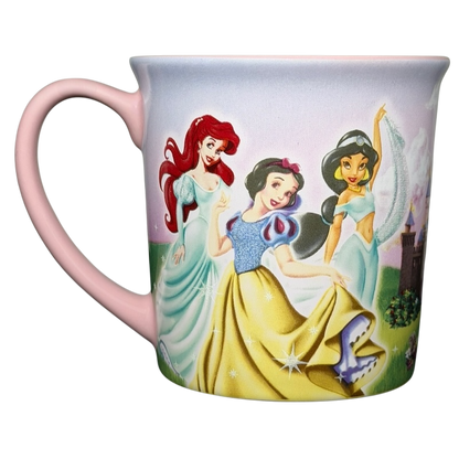Disney Princess Castle Disneyland Resort Mug featuring Snow White, Ariel, and Jasmine in a vibrant design