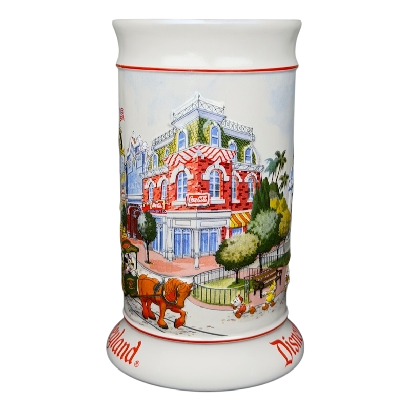 Disneyland Sleeping Beauty Castle Main Street USA Stein Mug featuring colorful artwork of Main Street