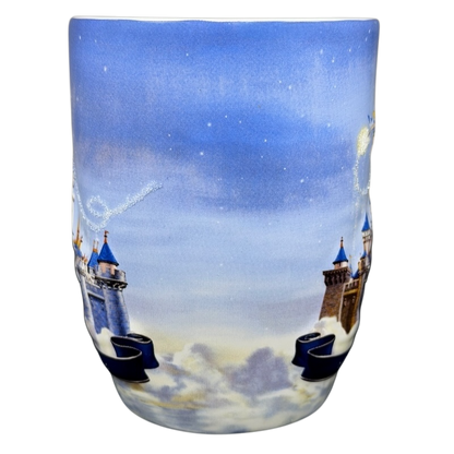 Disneyland Sleeping Beauty Castle mug featuring a whimsical design with a starry sky