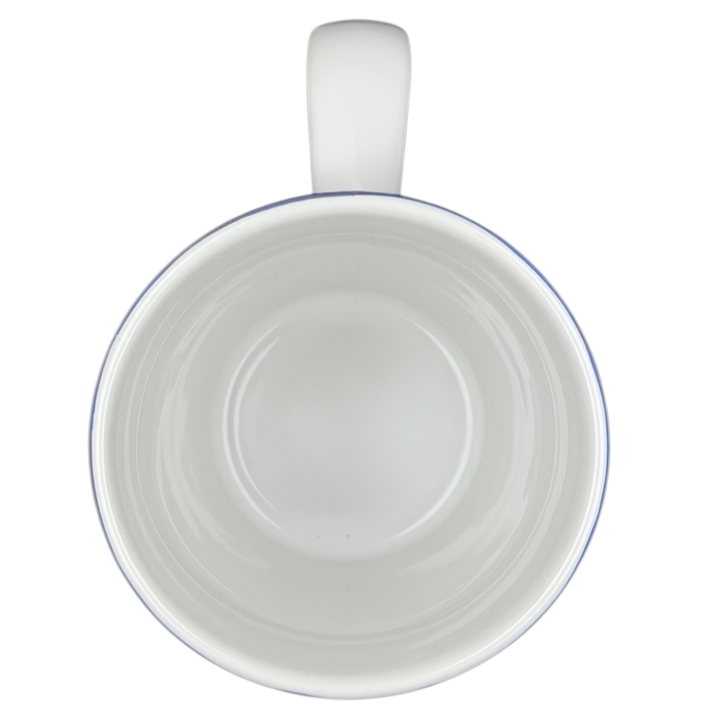 Inside view of a white Disneyland Sleeping Beauty Castle mug with a smooth finish